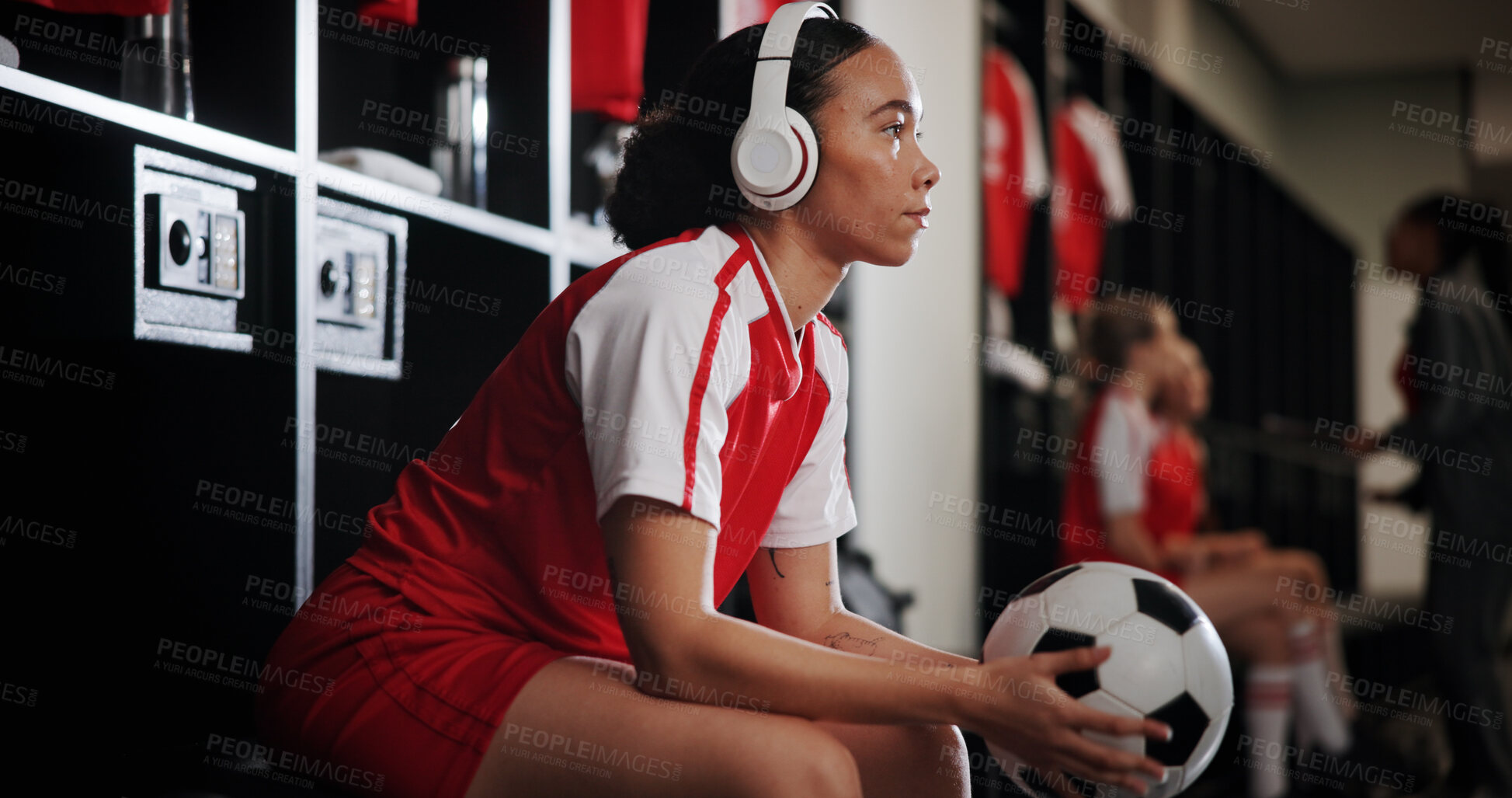 Buy stock photo Sports, locker room and woman with headphones and ball for music, audio and radio for tournament. Thinking, soccer and person for planning, reflection and thoughtful for match, game and practice