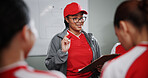 Women, coach and discussion with soccer team for game plan, strategy or meeting together. Female people, trainer or coordinator talking to group or players with clipboard for sport match or formation