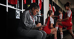 Woman, soccer coach and writing with clipboard for checklist, game plan or attendance list in locker room. Female person, manager or coordinator with notes for match, sport or player registration