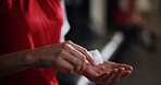 Soccer player, hands and pills with vitamin supplement for sport, challenge or competition in locker room. Closeup, person or athlete with medication, antibiotic or prescription for game or match
