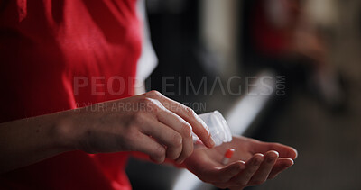 Buy stock photo Soccer player, hands and pills with vitamin supplement for sport, challenge or competition in locker room. Closeup, person or athlete with medication, antibiotic or prescription for game or match