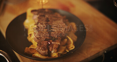 Buy stock photo Cooking, food and steak meal in kitchen for dinner recipe, dish presentation and pasta cuisine. Closeup, beef plate and lunch preparation with protein ingredients, fresh brunch and wellness nutrition