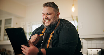 Buy stock photo Tablet, fist pump and chef in kitchen for online recipe planning or research for cook book with winning. Excited, technology and person read positive culinary review on restaurant business in home.