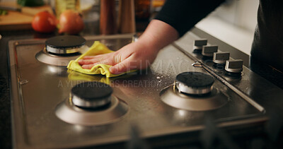 Buy stock photo Hand, cleaning stove and man with cloth, hygiene and routine with dirt, home and remove bacteria. Closeup, person and chef in kitchen, wiping and disinfection with responsibility and prevent virus