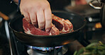 Cooking, hands and chef with steak in pan in kitchen for culinary skill, recipe and meal prep for dinner. Food, frying and person with beef, meat and sauce for gourmet dish, ingredients and cuisine