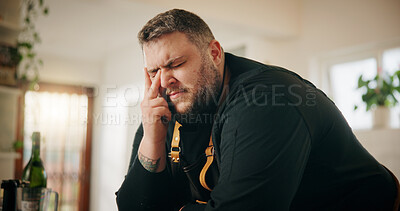 Buy stock photo Cooking, fatigue and stress with man in kitchen of home for crisis, failure or mistake. Frustration, headache and recipe disaster with chef in apartment for burnout, loss or small business startup