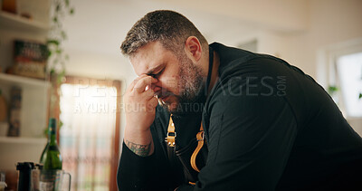 Buy stock photo Cooking, headache and stress with man in kitchen of home for crisis, failure or mistake. Fatigue, frustration and recipe disaster with chef in apartment for burnout, loss or small business startup