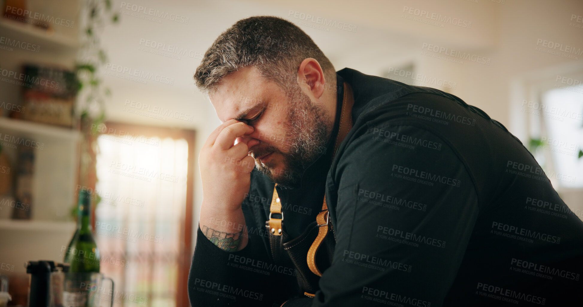 Buy stock photo Cooking, headache and stress with man in kitchen of home for crisis, failure or mistake. Fatigue, frustration and recipe disaster with chef in apartment for burnout, loss or small business startup