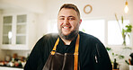 Portrait, chef and man with smile, kitchen or confident for culinary skills in restaurant or entrepreneur. Business, cook and person with apron for catering, proud or happy for growth of diner in USA