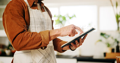 Buy stock photo Hands, tablet and man in kitchen, cooking and connection with online recipe, app and instructions. Closeup, person and chef with tech, home and internet with ingredients, network or website for food