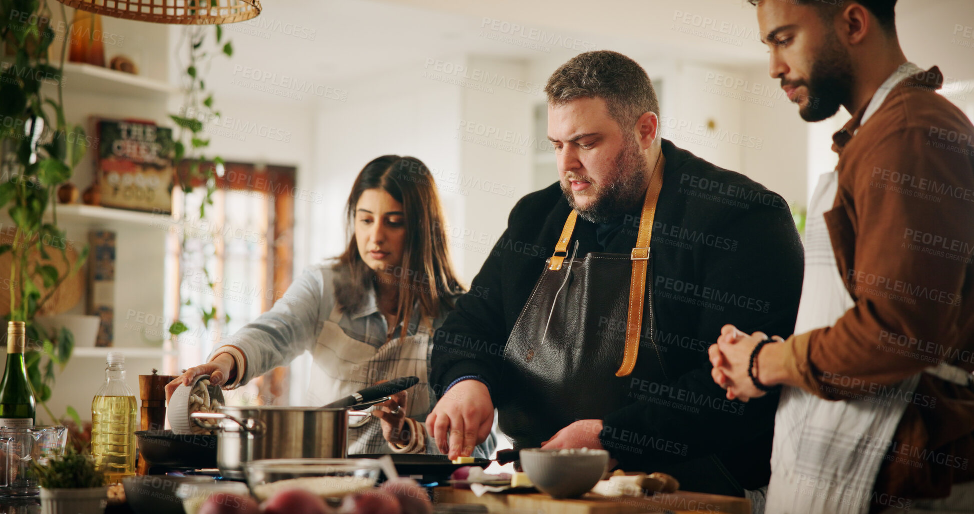 Buy stock photo Cooking, couple and chef with teaching in kitchen for meal preparation, culinary lesson and recipe instructions. Professional, people and learning food tutorial with dinner guidance and demonstration