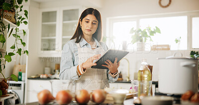 Buy stock photo Woman, tablet and cooking with kitchen, recipe and home with food ingredients and internet instructions. Technology, blog and preparation with chef person in apartment for diet, health or nutrition