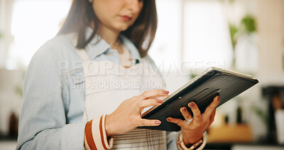 Buy stock photo Hands, tablet and woman in kitchen, cooking and digital app for online recipe, website info and instructions. Closeup, person and chef with tech, home and nutrition with ingredients and connection