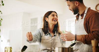 Buy stock photo Cooking, couple and happy with food in kitchen for dinner recipe, meal preparation and support. Bonding, people and conversation in home with lunch date, connection and helping hand with nutrition