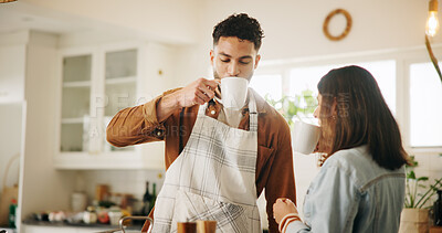 Buy stock photo Drinking, relax and couple with coffee in kitchen for bonding, connection or cooking together. Happy, love and man with woman for enjoying caffeine beverage for recipe in morning on weekend in home.