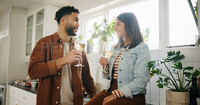 Buy stock photo Kitchen, couple and glasses of wine for date, connection and anniversary in healthy relationship. Home, man and woman with alcohol drink for conversation, commitment and bonding with love in marriage