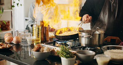 Buy stock photo Cooking, pan and hands of man with fire in house kitchen for diet, private service and nutrition. People, recipe and personal chef frying food with flame for gourmet cuisine, hospitality or lunch