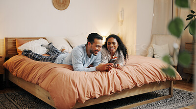Buy stock photo Happy couple, laughing or phone on bed for online entertainment, humor or comedy at home. Man, woman or lovers with smile on mobile smartphone for movie, app or subscription in bedroom at house