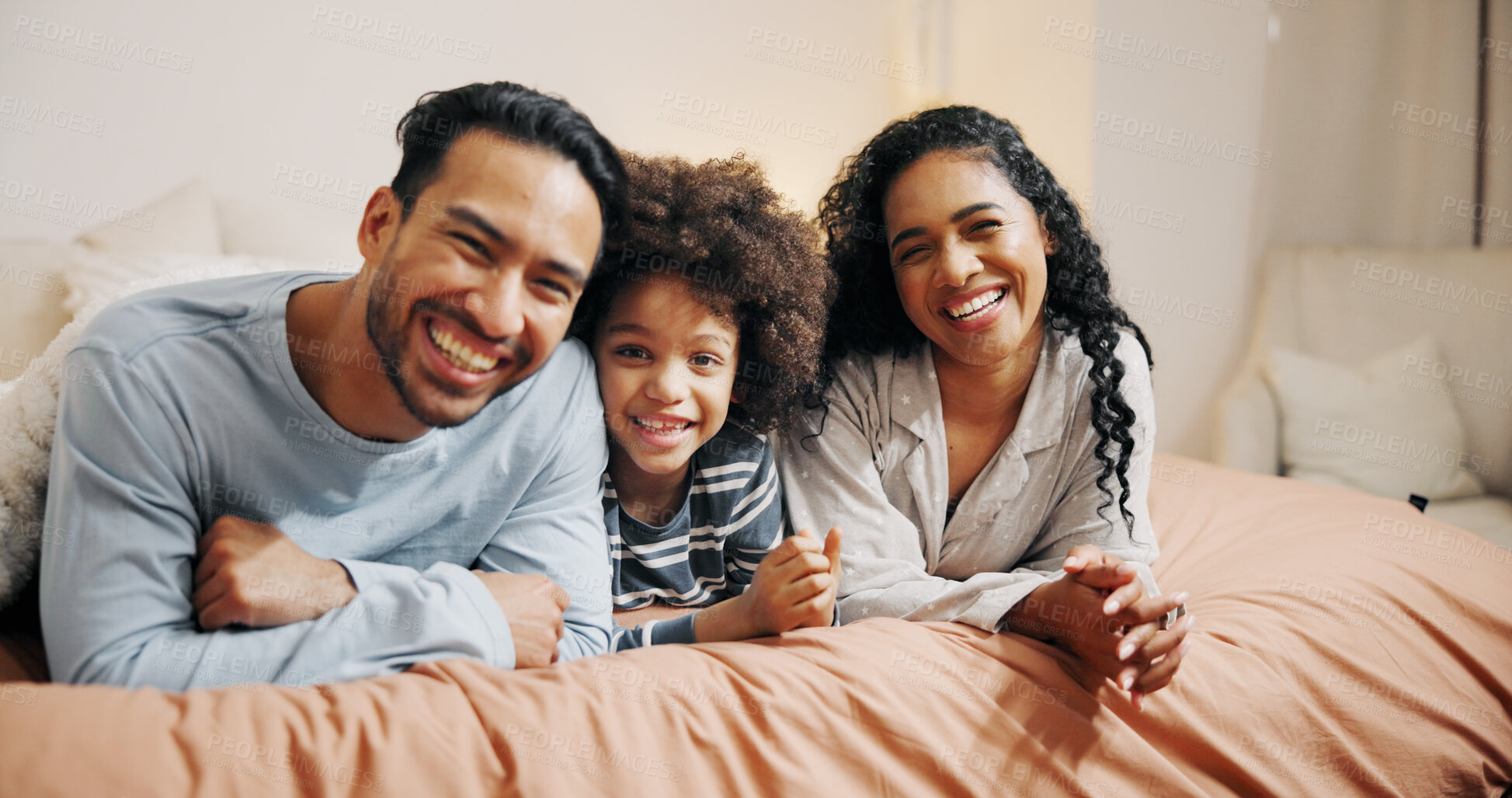Buy stock photo Bedroom, portrait and family with boy, smile and bonding together with care, relaxing and calm. Face, parents and mother with father, love and child with son, home and morning with happiness or kid