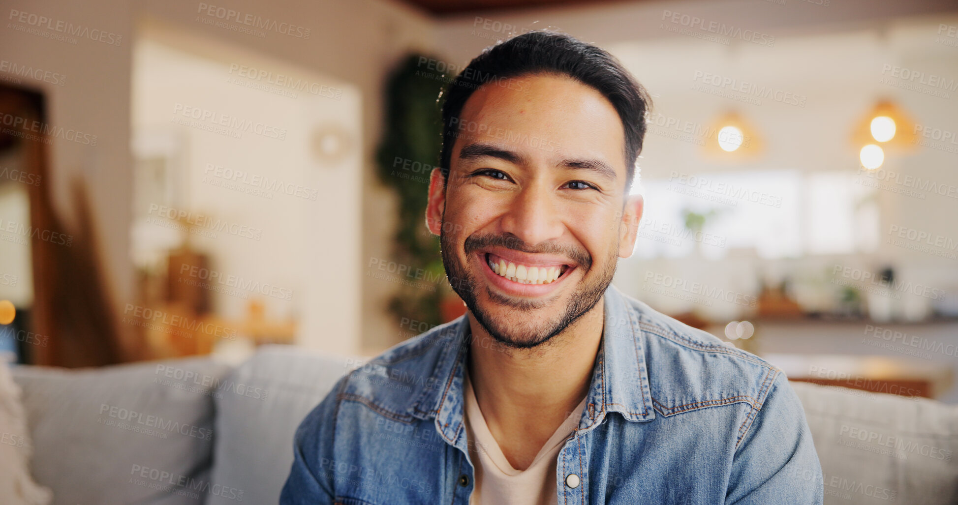Buy stock photo Happy, relax and portrait of man in new home with confidence for property ownership. Smile, pride and male person from India with calm, peace and positive attitude in living room at apartment.