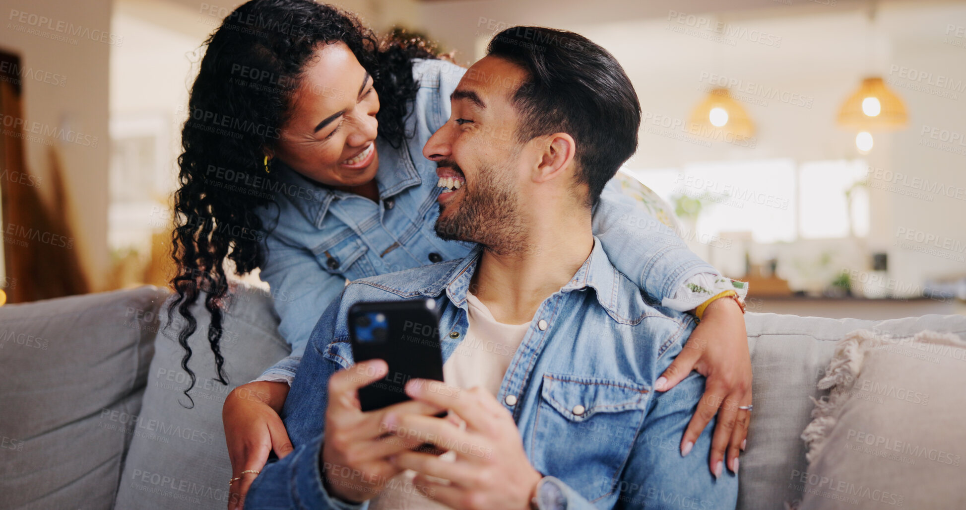 Buy stock photo Laugh, couple and phone in home for funny video, social media and bonding together on weekend. Mobile, happy man and woman in living room for joke, streaming comedy or communication online with app