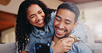 Hug, couple and mobile in home with happiness, love and bonding together with social media on weekend. Phone, man and woman in living room streaming comedy, funny story and internet meme to relax