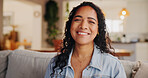 Happy woman, portrait and relax on sofa for holiday, weekend or fun free time at home. Face, female person or smile in joy with comfort, house interior or design on furniture for indoor break or rest
