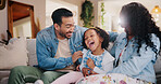 Parents, girl and tickle on couch, laugh and bonding with love, comic joke and relax in lounge at family house. People, mother and father with child, care and funny games in living room at apartment