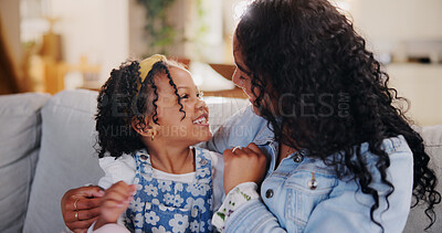 Buy stock photo Happy, hugging and mom with child on sofa for mothers day, bonding or family connection in home. Smile, sweet and woman embracing girl kid for care, trust or safety in living room in house together.