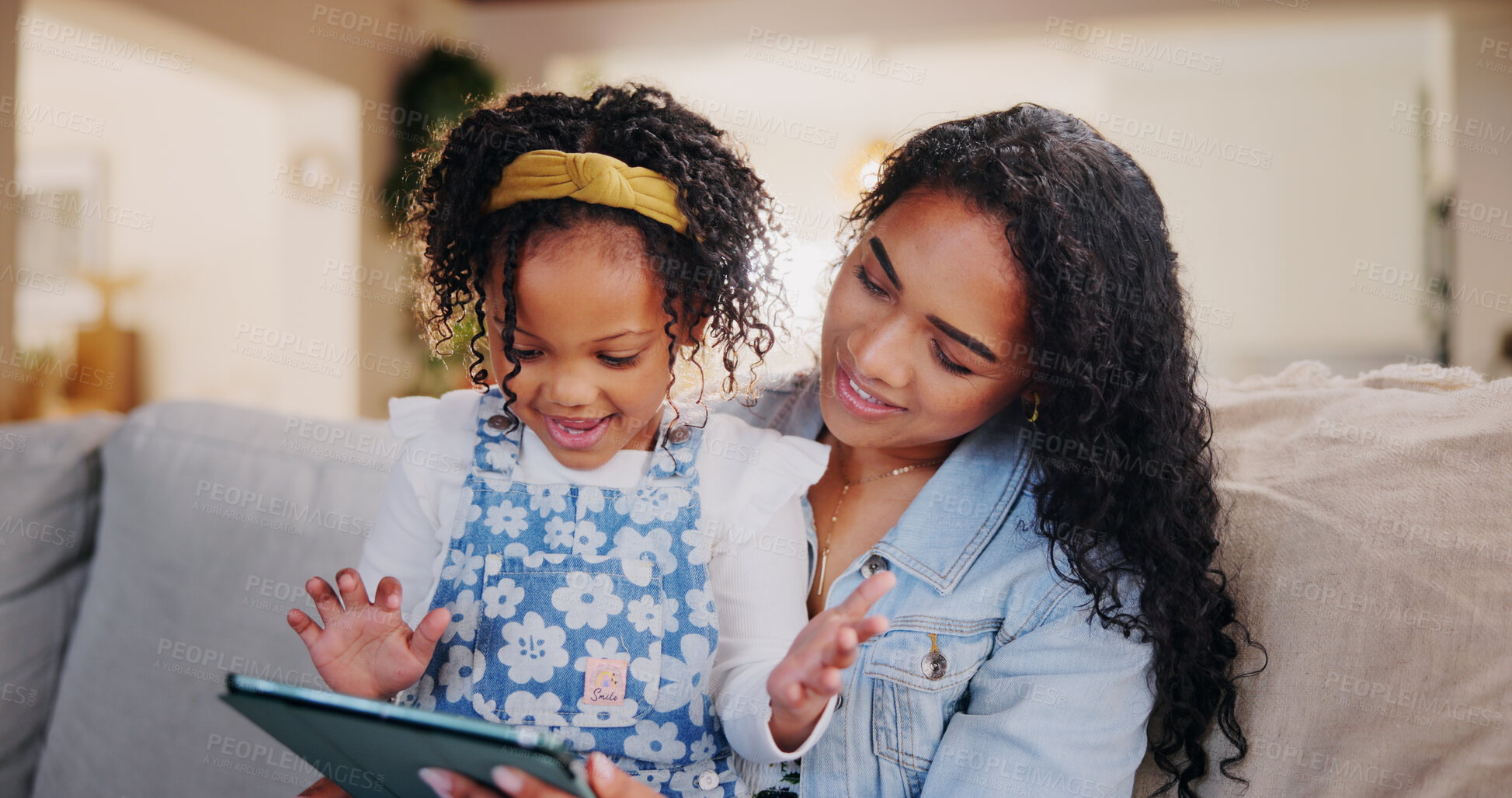 Buy stock photo Mother, child and tablet in home for education, storytelling or reading ebook together. Girl, kid and parent with technology on sofa for learning, teaching or play game on internet with happy family