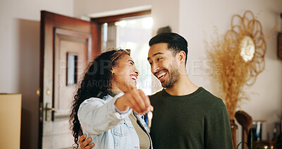 Buy stock photo Couple, key and moving in with new home, laughing and finance investment together. Excited man, woman and smile with property, real estate or house for mortgage loan, renovation or relocation success
