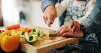 Hands, parent and child with vegetables to chop, cooking and bonding with learning skills at home. Kitchen, kid and dad with teaching for cutting, organic food and meal prep with pepper in closeup