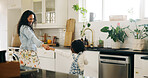 Dancing, mother and girl in kitchen, home and bonding together with happiness, support and energy. Family, parent and mama with daughter, movement and child development with love, celebration or care