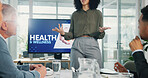 Presentation, health and wellness with screen at office, hands and crowd with advice, info or pitch. Person, speaker and audience with monitor, discussion and agenda in boardroom at corporate agency