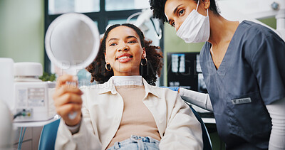 Buy stock photo Dentist, woman and happy with results in mirror for teeth whitening, root canal treatment and healthcare service. Dental, professional and patient with oral hygiene, mouth procedure and consultation