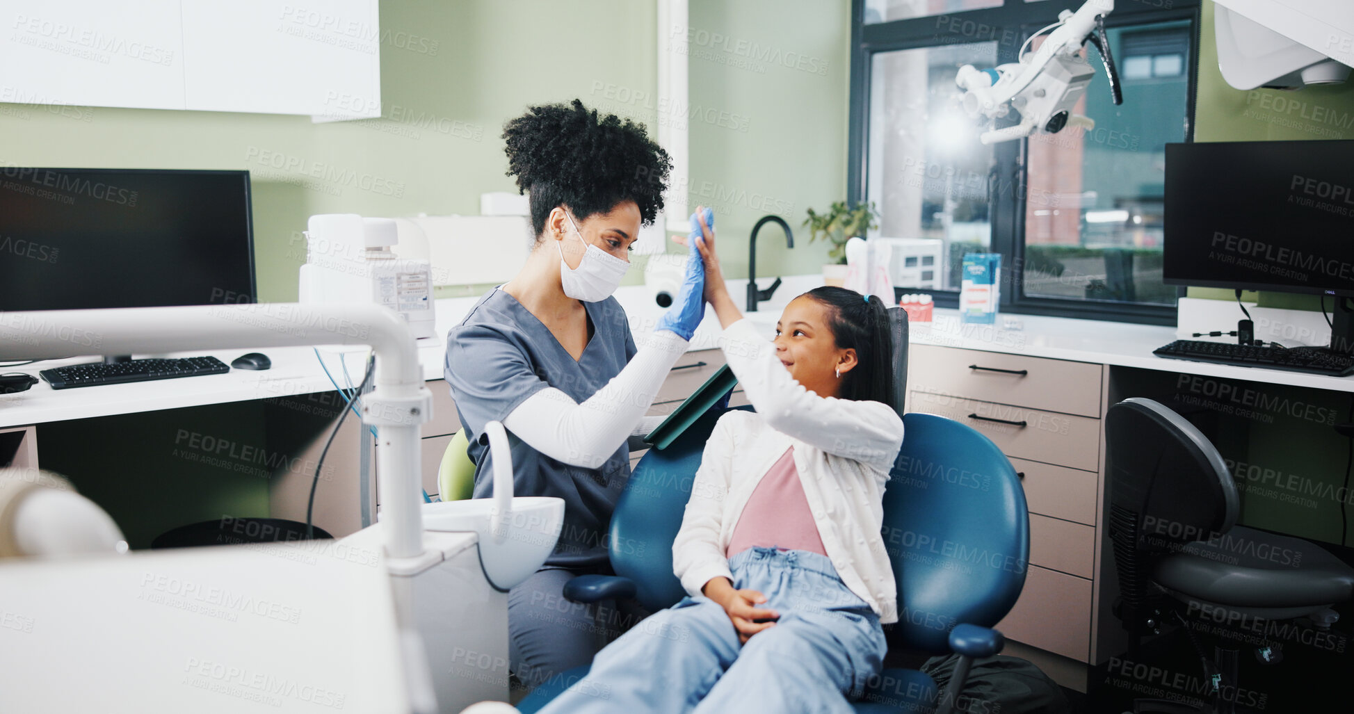 Buy stock photo Dentist, girl and high five with smile for results, motivation or support for oral health at hospital. Woman, child and celebration for teeth whitening, happy or tooth extraction with care at clinic