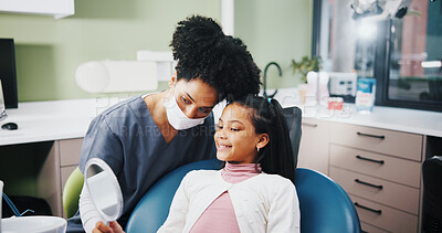 Buy stock photo Dentist, child and happy with results in mirror for teeth whitening, root canal treatment and healthcare service. Dental, expert and girl patient with oral hygiene, mouth procedure and cavity removal