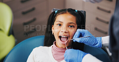 Buy stock photo Child, dentist and portrait in consultation for dental care, plaque removal and cavity inspection with tools. Girl, orthodontist hands and oral exam in practice for cleaning, check gums and service