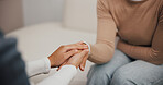 Doctor, woman and holding hands to support patient in office for medical results for advice in consultation. Clinic, person and together for diagnosis or feedback with help, empathy or sympathy