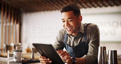 Buy stock photo Cocktail, pub and bartender man with tablet for recipe research, stock management or online order. Mixology, drinks or server on digital app for inventory checklist, menu planning and small business