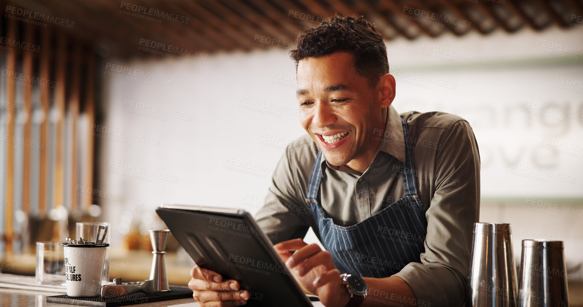 Buy stock photo Cocktail, pub and bartender man with tablet for recipe research, stock management or online order. Mixology, drinks or server on digital app for inventory checklist, menu planning and small business