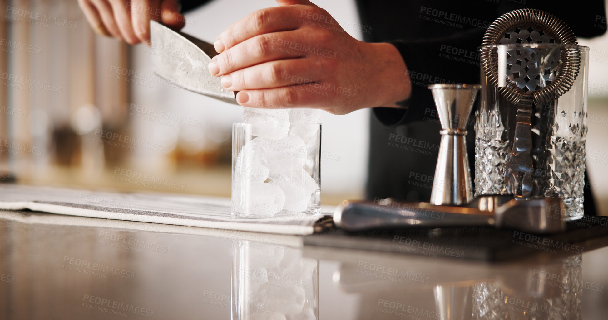 Buy stock photo Cocktail, ice and hands of bartender man with glass, cafe and tools for artisan beverage recipe. Mixology, small business pub and barman at counter with happy hour drinks, process and craft alcohol