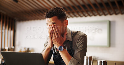 Buy stock photo Frustrated man, barista and laptop with mistake for fatigue, eye strain or company bankruptcy at restaurant. Male person, bartender or overworked on computer for fail, loss or debt at indoor bar
