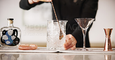 Buy stock photo Cocktail, mixology and hands of bartender with glass, ice and tools for artisan beverage recipe. Cafe, small business pub and man at bar counter with happy hour drinks, process and craft alcohol