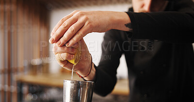 Buy stock photo Cocktail, cafe and hands of bartender with lemon, shaker and tools for artisan beverage recipe. Mixology, small business pub and person at bar counter with happy hour drinks, juice and craft alcohol
