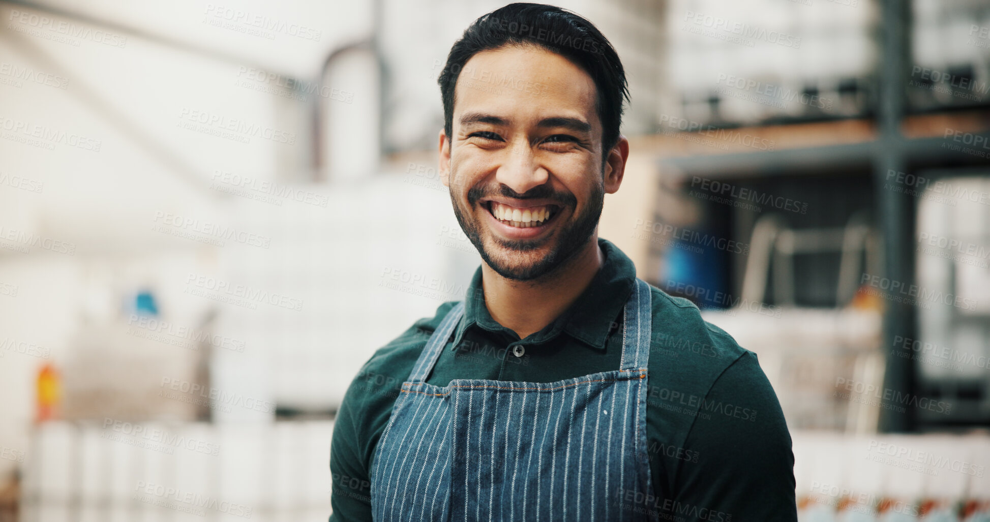 Buy stock photo Manufacturing, portrait and smile of man in distillery for fermentation or production of beer. Apron, factory and small business with happy brewer at industrial plant for alcohol bottling process