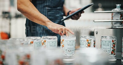 Buy stock photo Distillery, bottle and tablet with hands in factory for packaging, assembly line and inspection checklist. Manufacturing, inventory and distribution with person in warehouse for quality control