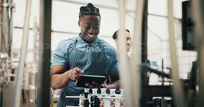 Buy stock photo Distillery, tablet and happy man in factory for alcohol production, manufacturing or distribution checklist. Brewery, storage and person on tech for fermentation, quality control and inspection