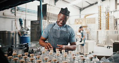 Buy stock photo Distillery, bottle and export with man in factory for packaging, assembly line and supply chain inspection. Manufacturing, inventory and distribution with person in warehouse for quality control