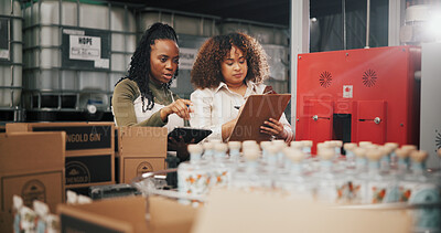 Buy stock photo Distillery, team and checklist with women in factory for packaging, drink production and bottle inspection. Manufacturing, inventory and distribution with people in warehouse for quality control
